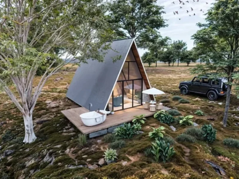 Cabaña minimalista con terraza y bañera exterior